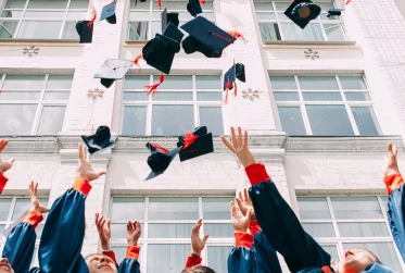 graduates celebrate UN001 v1