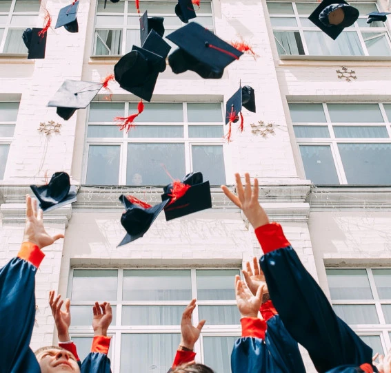 graduates celebrate UN001 v1