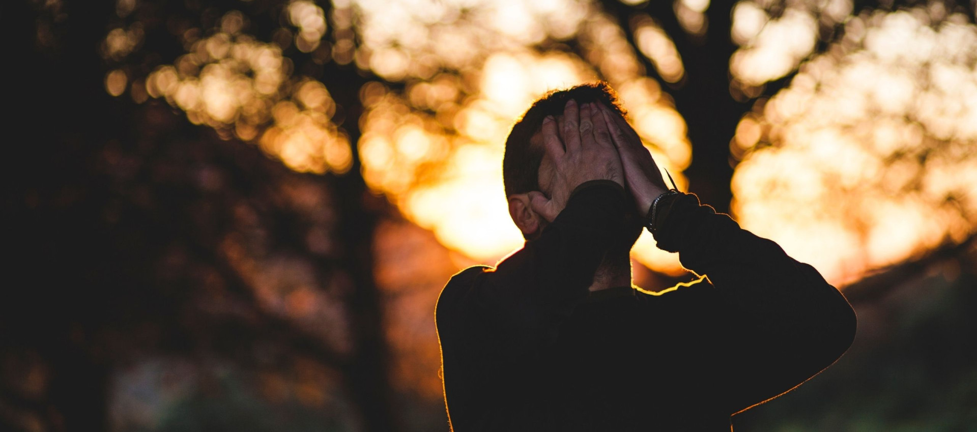 man covering his face UN001 v2