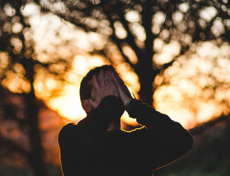 man covering his face UN001 v2