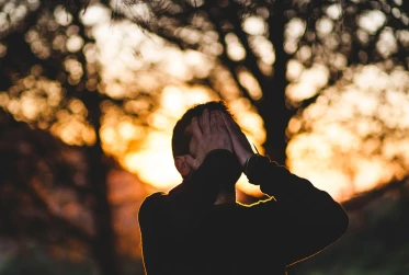 man covering his face UN001 v2
