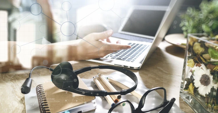 person at computer with dots overlay SH001