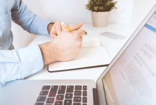 person writing UN001