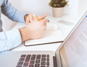 person writing UN001