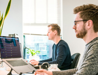 professional man on computer UN001