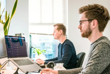 professional man on computer UN001