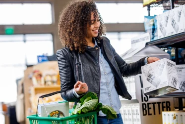woman carrying a grocery basket UN001 v2
