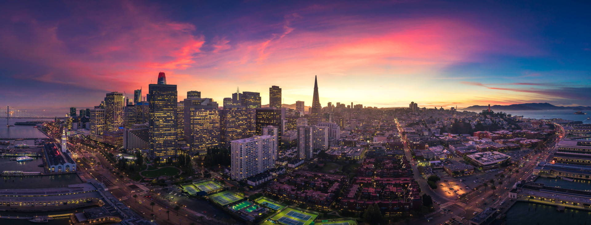 panorama aerial view of downtown san francisco at sunset
