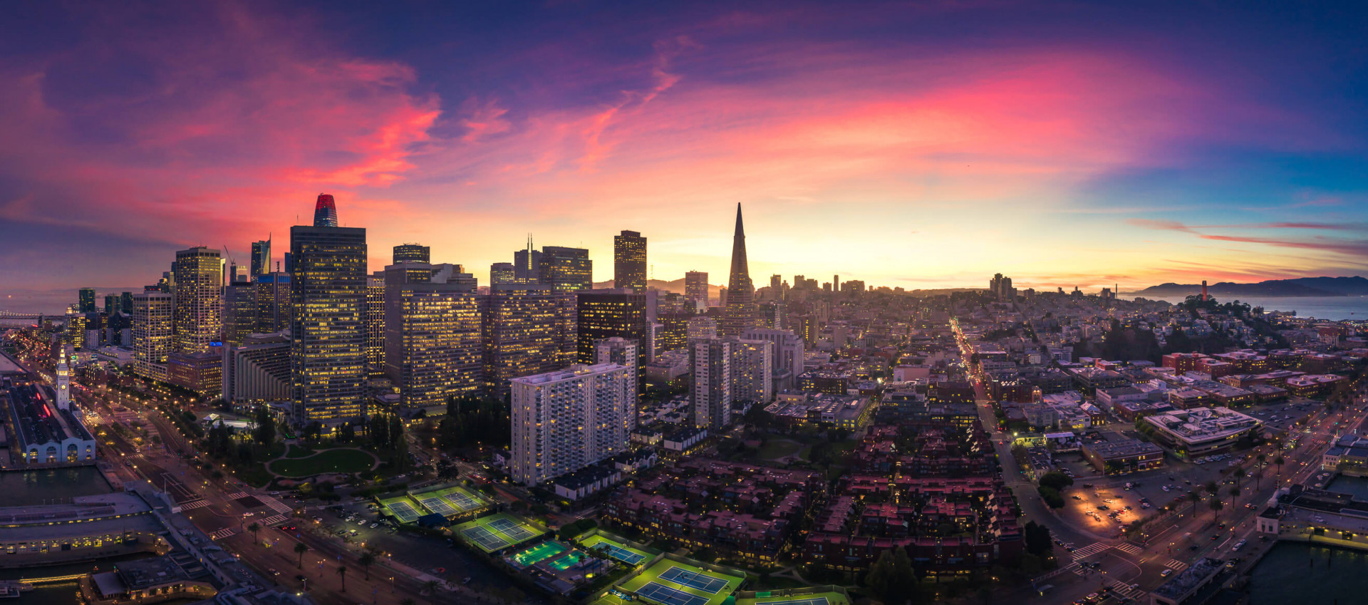 panorama aerial view of downtown san francisco at sunset