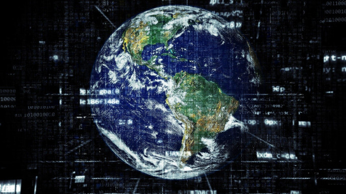 planet earth with shades of technology and code on a black background