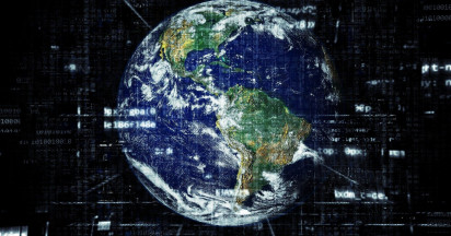 planet earth with shades of technology and code on a black background