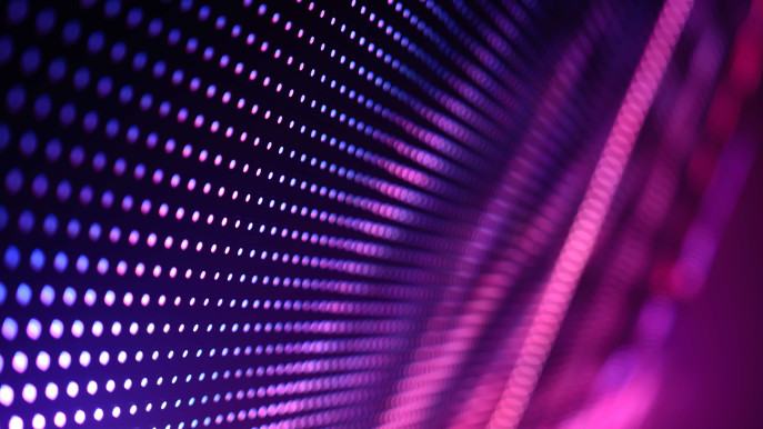 digital pattern of a wall of dots in purple and pink colours