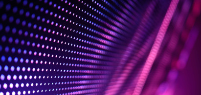 digital pattern of a wall of dots in purple and pink colours