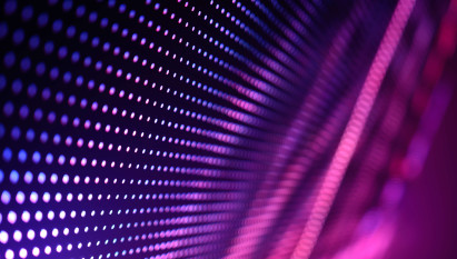 digital pattern of a wall of dots in purple and pink colours