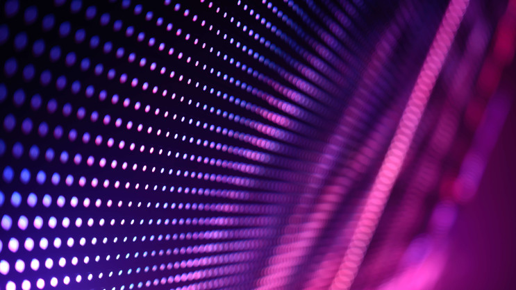 digital pattern of a wall of dots in purple and pink colours