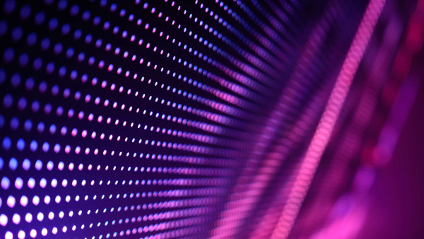 digital pattern of a wall of dots in purple and pink colours