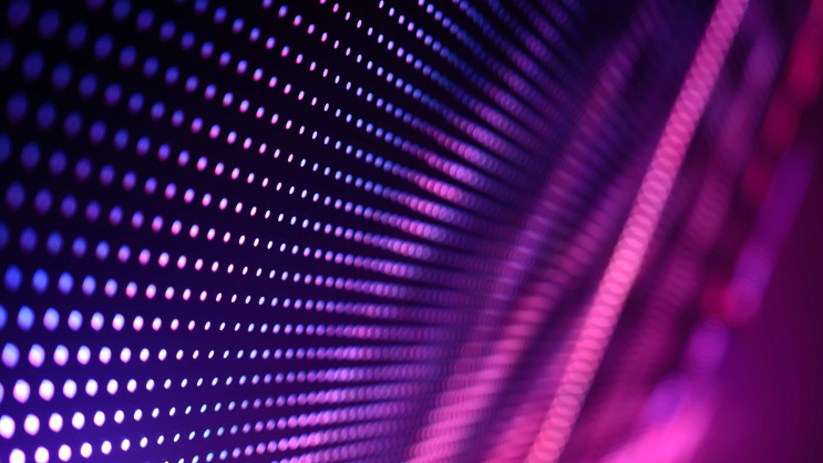 digital pattern of a wall of dots in purple and pink colours