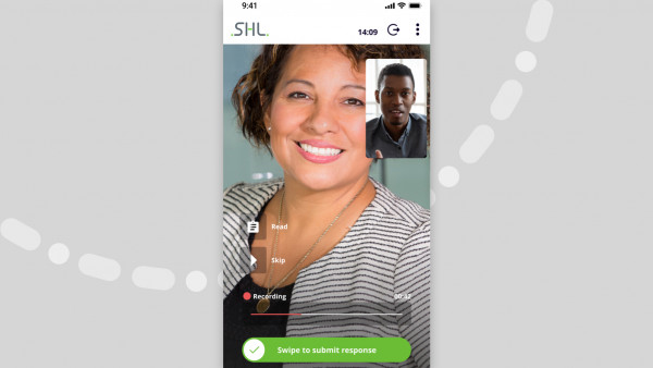 mobile screenshot of two people in an interview with a prompt for the user to swipe and submit a response